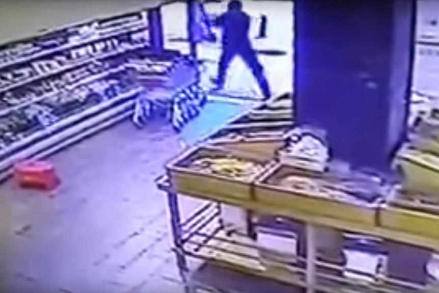 Still of CCTV footage shows Tel Aviv shooter preparing to attack