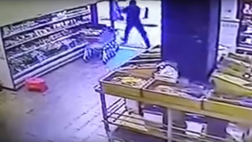 Still of CCTV footage shows Tel Aviv shooter preparing to attack