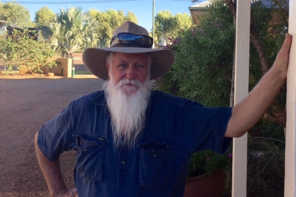 John Hammond standing in front of his motel in Boulia.