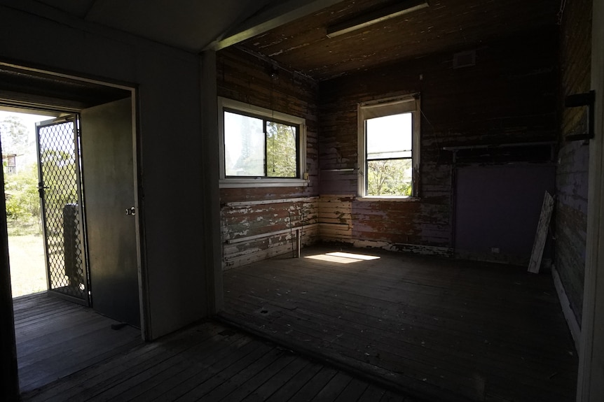 An empty wooden room.