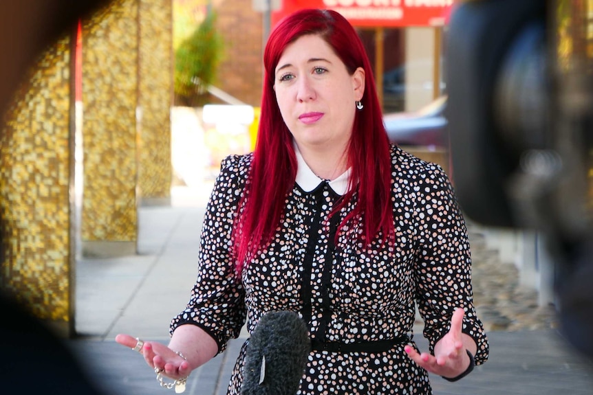 Tara Cheyne looks sad as she addresses the media outside the ACT Legislative Assembly.