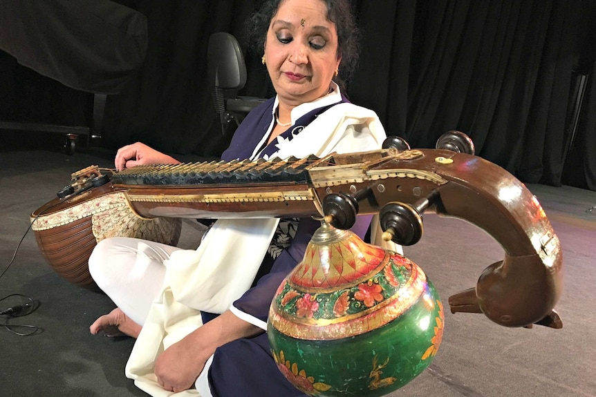 Indian music teacher Shobha Sekhar with a veena