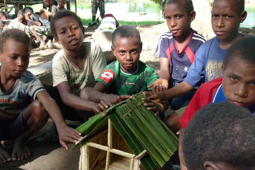 Learning to build a hut Elementary school Towingjamb