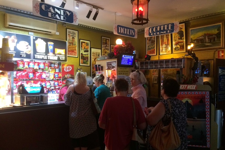A crowd at the candy bar at the Plaza Theatre, which is popular with visitors and residents to the Camden Haven area.