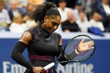Arm wrestle ... Serena Williams applauds a Simona Halep shot during their three-set contest