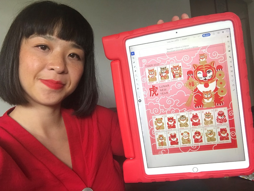 Chrissy Lau with her Year of the Tiger stamp design