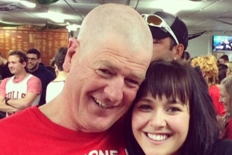 Young woman and an older man in Cystic Fibrosis tee shirts