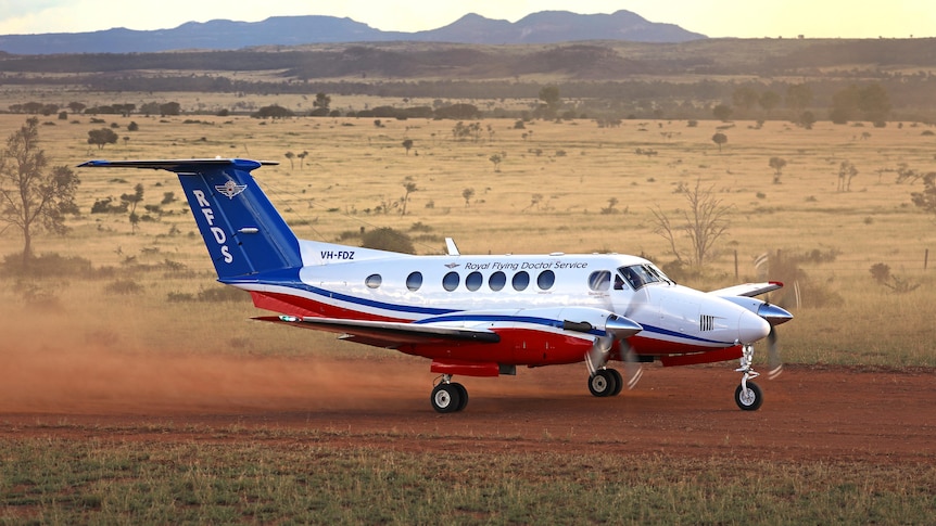 Royal Flying Doctors Service lands on red dirt in the outback