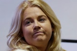 Cassie Sainsbury looks nervous while waiting in court.