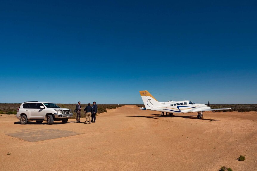 Eucla airstrip with plane parked on runway