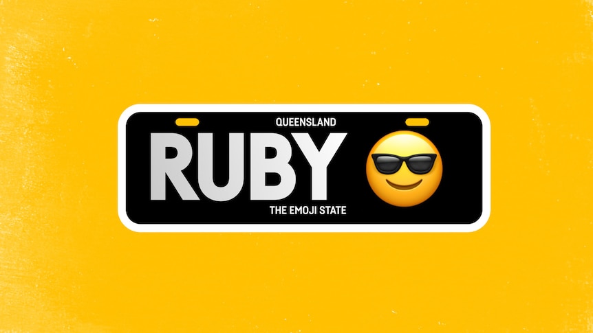 black number plate saying RUBY and a sunnies smiley face emoji.