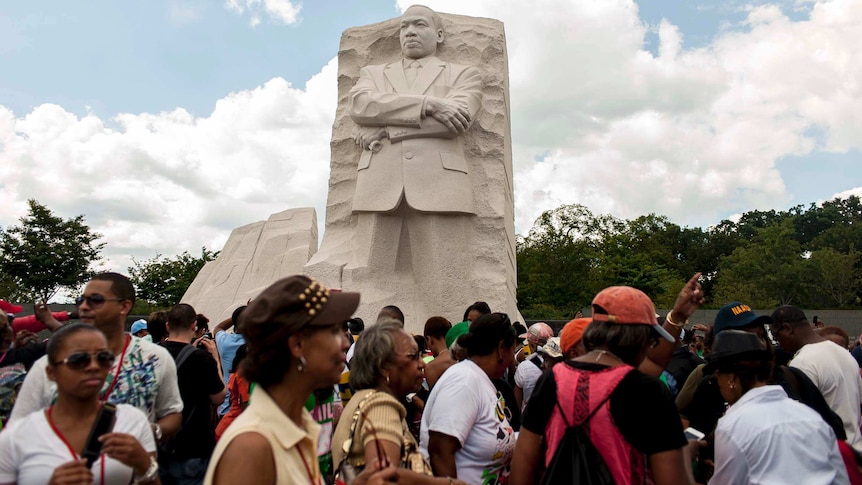 People visit the Martin Luther King Jr. Memorial in Washington DC