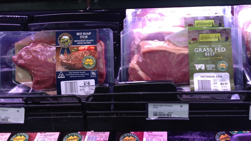 Grass fed and grain fed beef on supermarket shelf