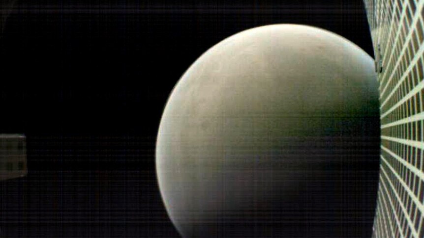 Mars is seen in the right hand corner of image against black space backdrop with Marco B cubesat satellite in view.