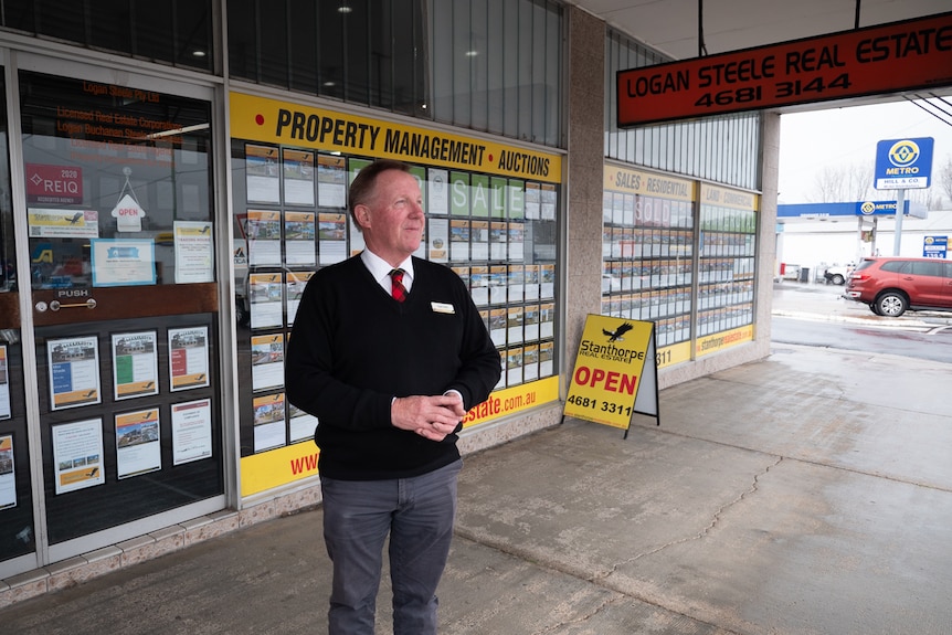 Real estate agent Logan Steel stands out the front of his office in Stanthorpe, June 2021.