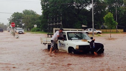 Ute stalls on flooded Kununurra road