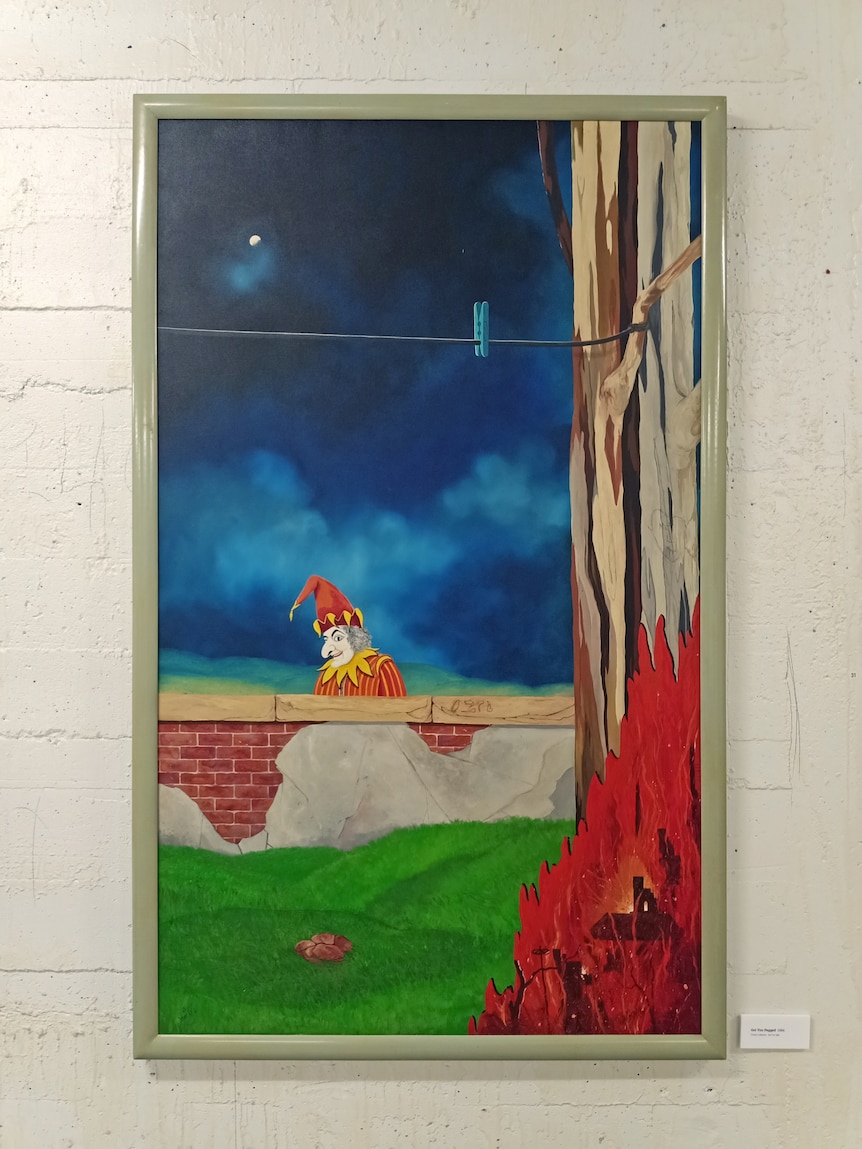Painting of a clown looking at a clothes peg in a garden.