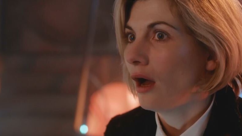 A close-up still from a video of Jodie Whittaker after the Doctor Who regeneration.