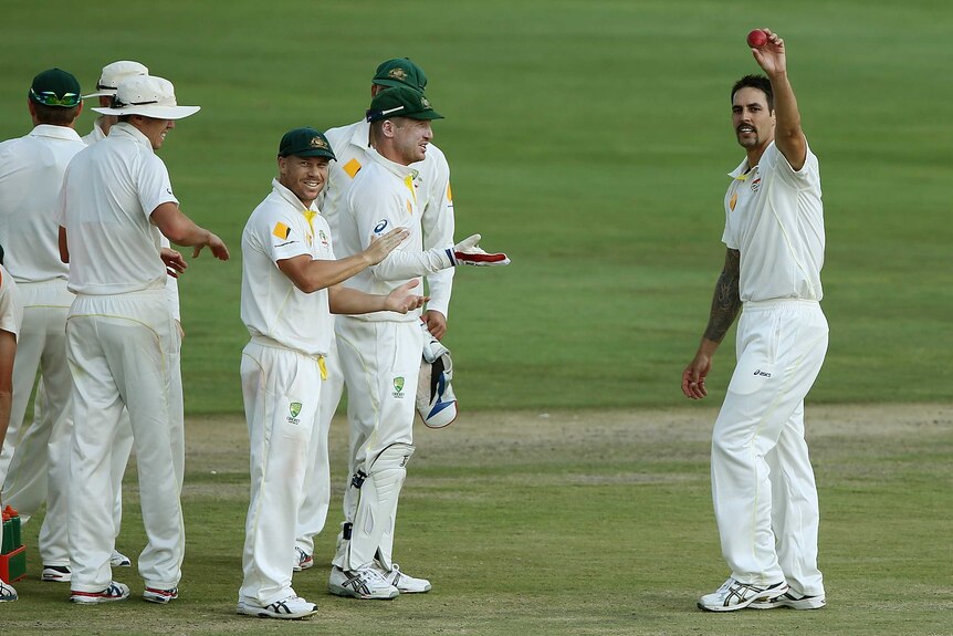 Mitchell Johnson celebrates taking five wickets