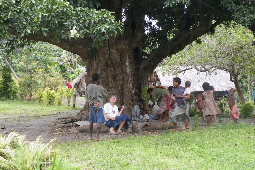 Meg chatting with local children  