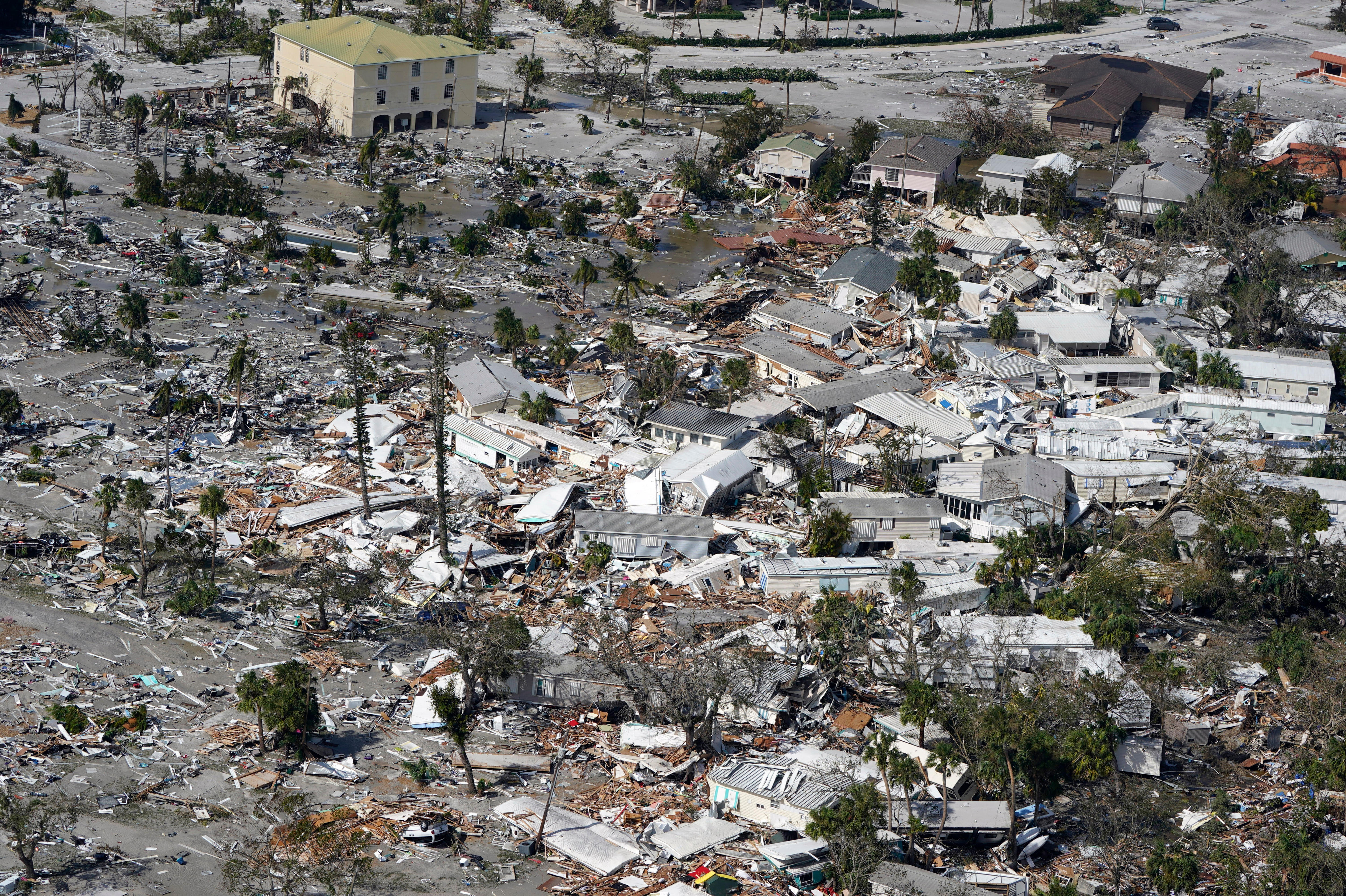 Residents Search For Missing People After Hurricane Ian Rips Through ...