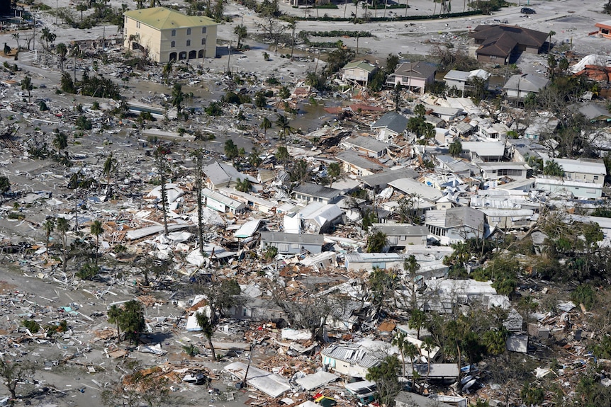 Aerial view of damaged homes and debris after Hurricane Ian hit Florida.