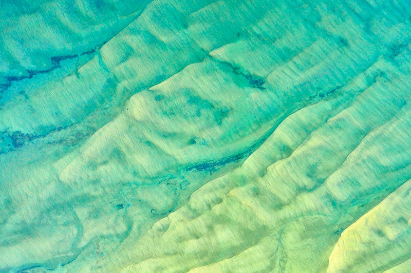 Photographic art depicting the shallow seas and seafloor in the Limmen Bight marine park, taken by Paul Arnold, 2019.