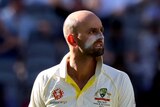 Nathan Lyon with the ball in hand