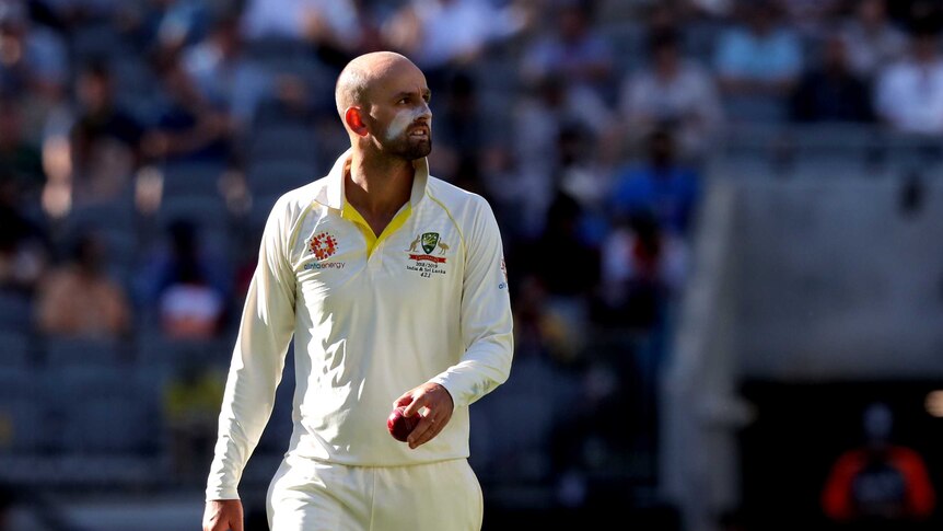 Nathan Lyon with the ball in hand