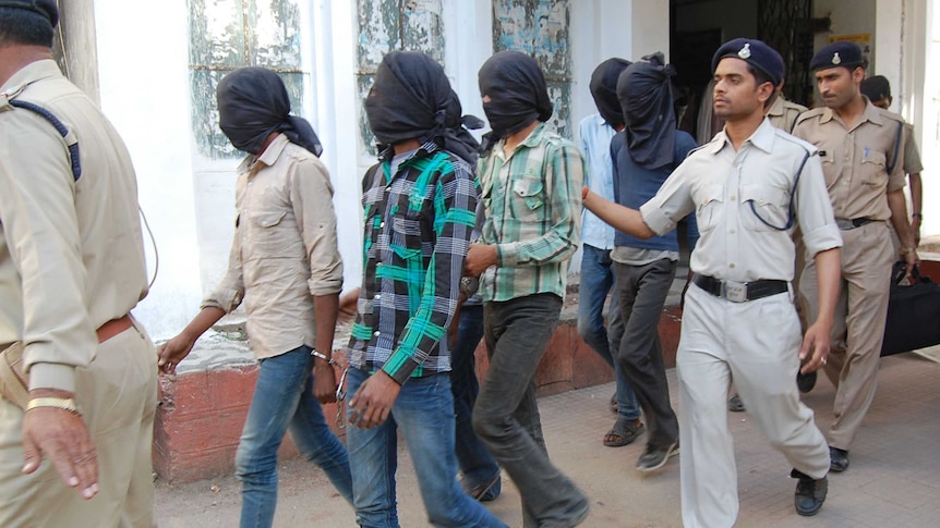 India gang-rape suspects escorted by police