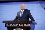 Scott Morrison reads from a teleprompter at the National Press Club.