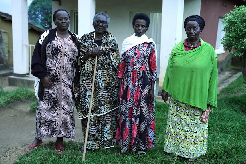 Marie Golithi Uwisenga and Chaliroti Mutegarugori with relatives.