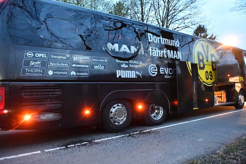 Damaged Borussia Dortmund team bus