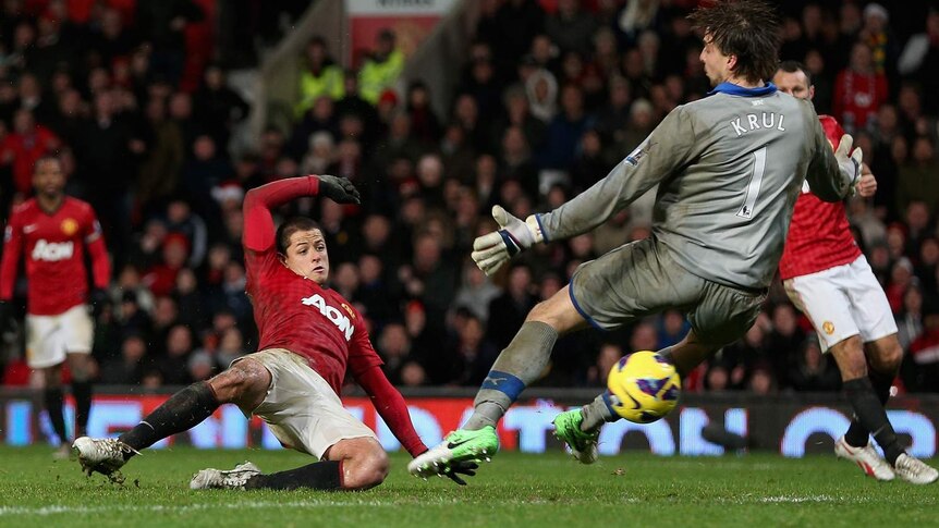 Manchester United's Javier Hernandez scores the winning goal past Newcastle United's Tim Krul.