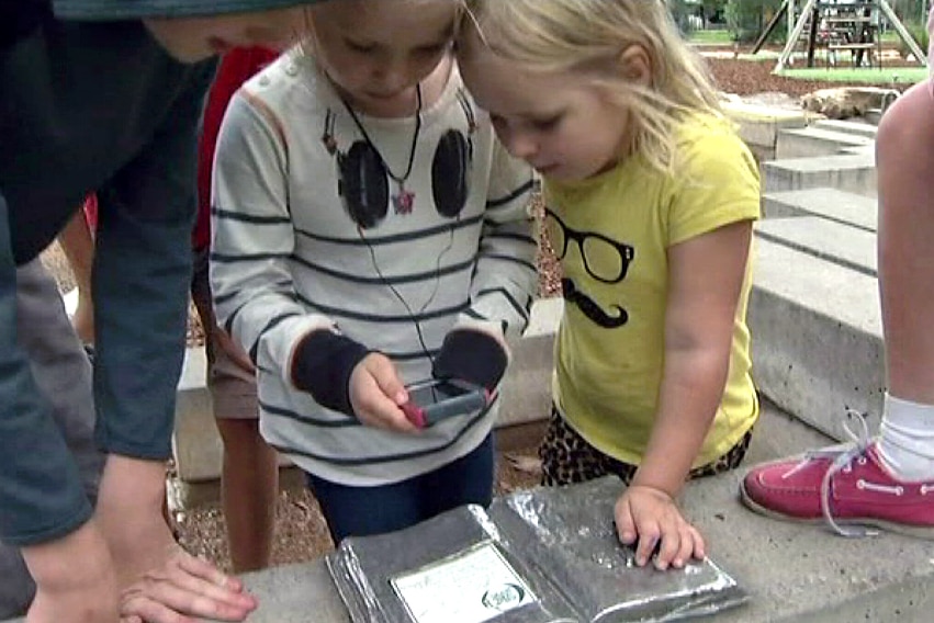 Children scan code at Western Sydney Parklands