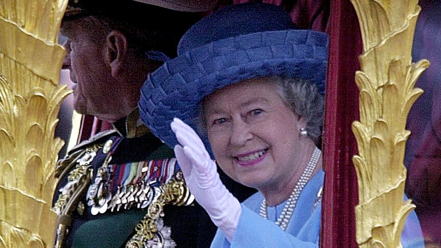 Queen Elizabeth II waves to the crowd on her Golden Jubilee.