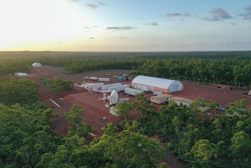 A collection of buildings amid scrub in the Northern Territory