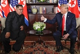 Donald Trump gives the thumbs up with Kim Jong-un