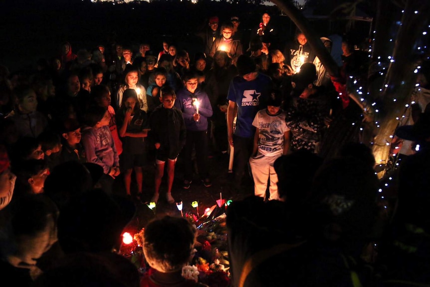 Children stand around a vigil for Elijah Doughty in Kalgoorlie. August 30, 2016.
