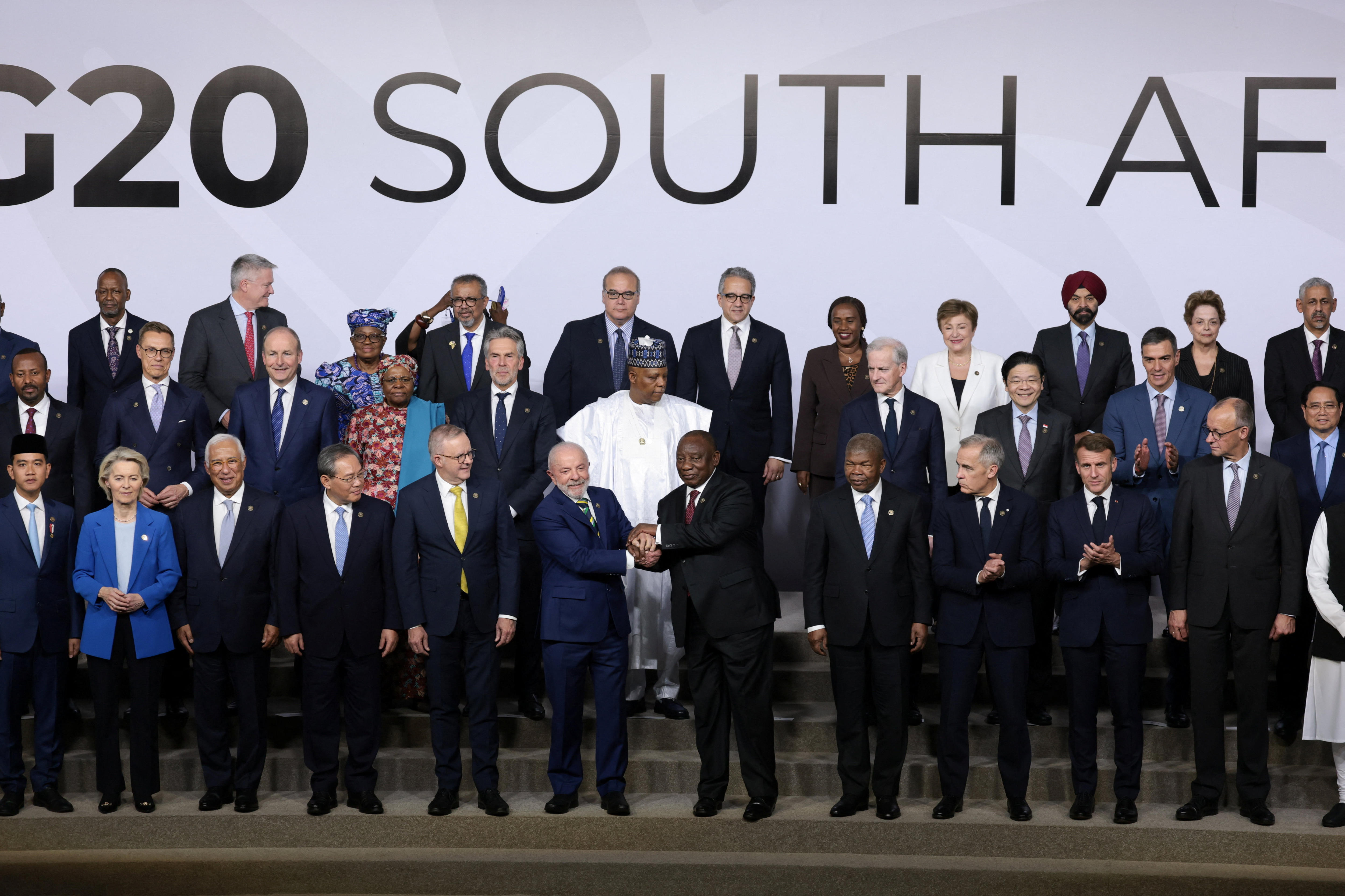A line of world leaders in suits at the G20 summit.
