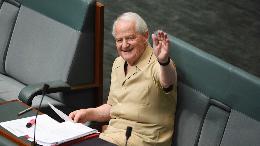 Philip Ruddock wears a safari suit for charity in the chamber at Parliament House in Canberra.