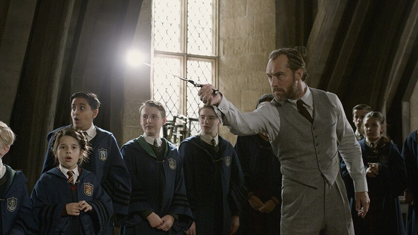 Colour still of Jude Law as Albus Dumbledore in 2018 film Fantastic Beasts: The Crimes of Grindelwald.