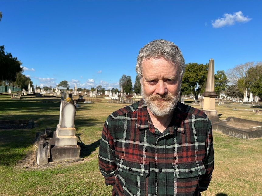 Chris Dawson at the cemetery.