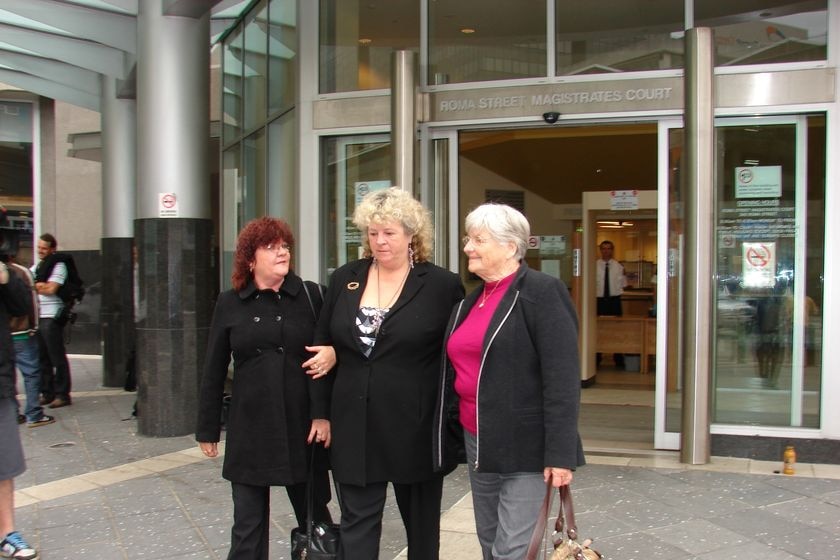 Bundaberg residents Lisa Hooper, Beryl Crosby and Judy Kemps walking outside Brisbane court.