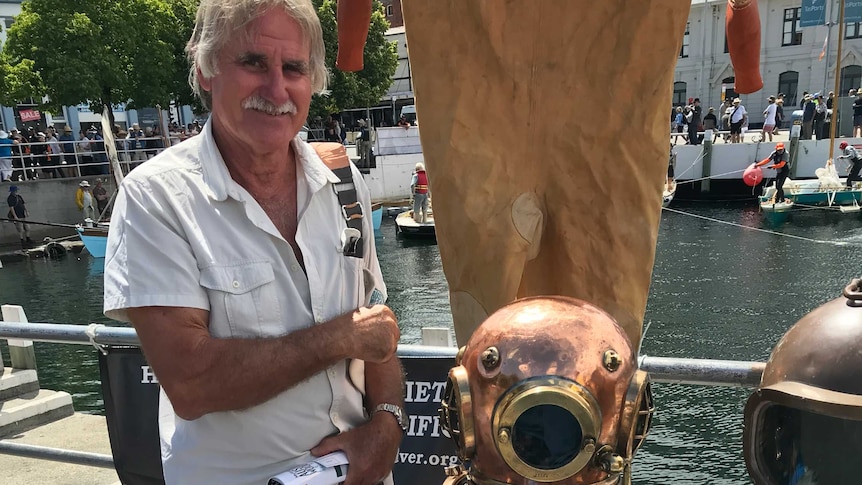 Brian at the docks in Hobart with a 1920s dive helmet.