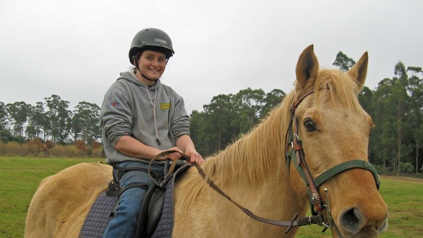Katherine Reed, Tasmanian paraplegic basketballer, on her horse