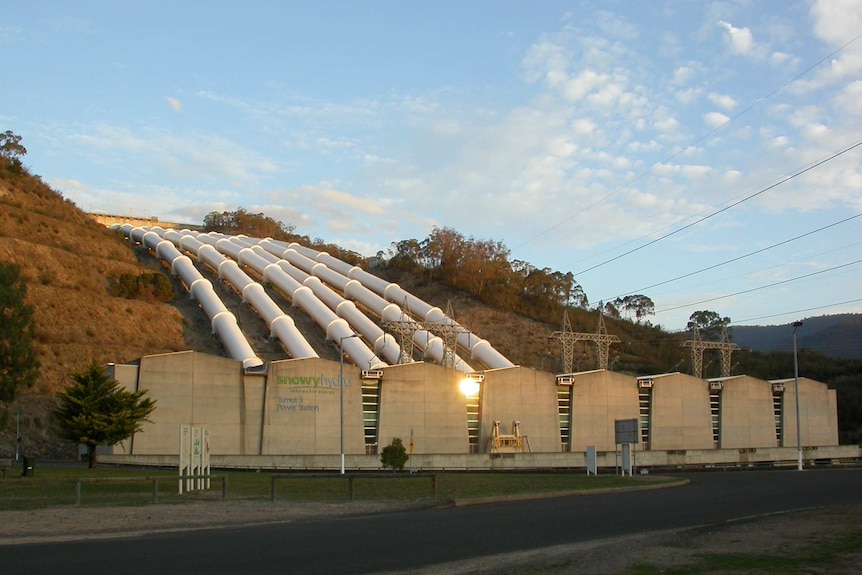 A series of big pipes running down a hill