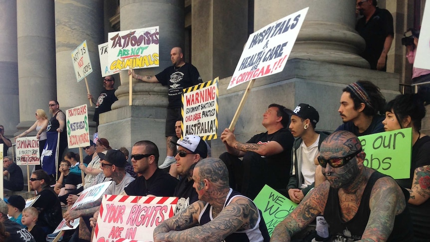 Tattoo workers protest proposed regulations