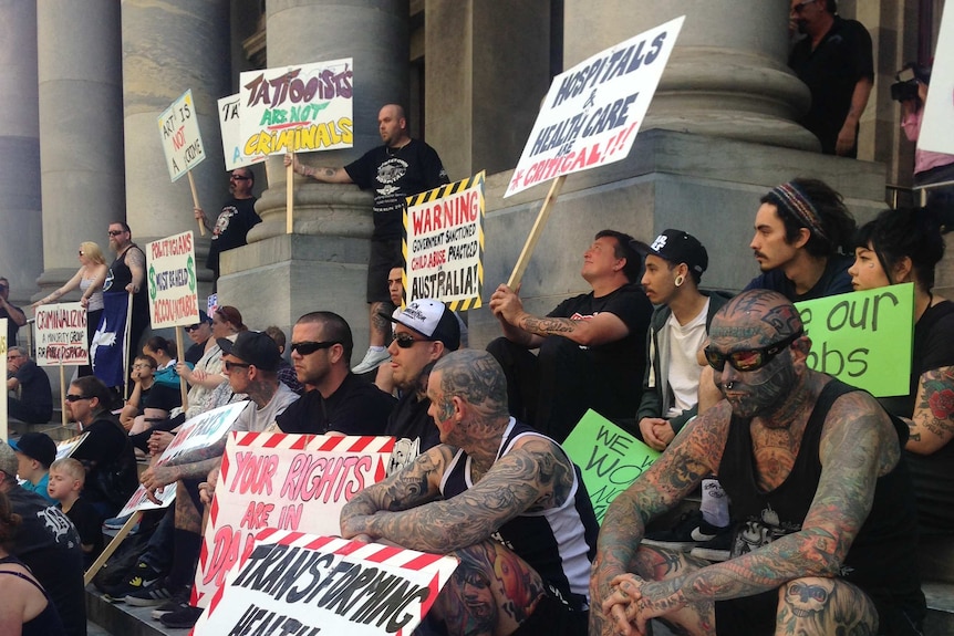 Tattoo workers protest proposed regulations