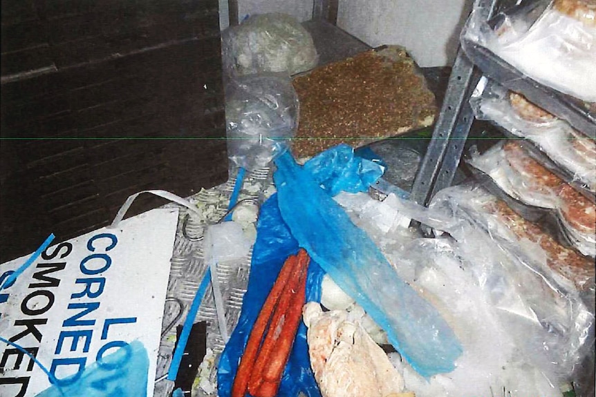 Exposed meat among rubbish on floor of Canberra take away store coolroom
